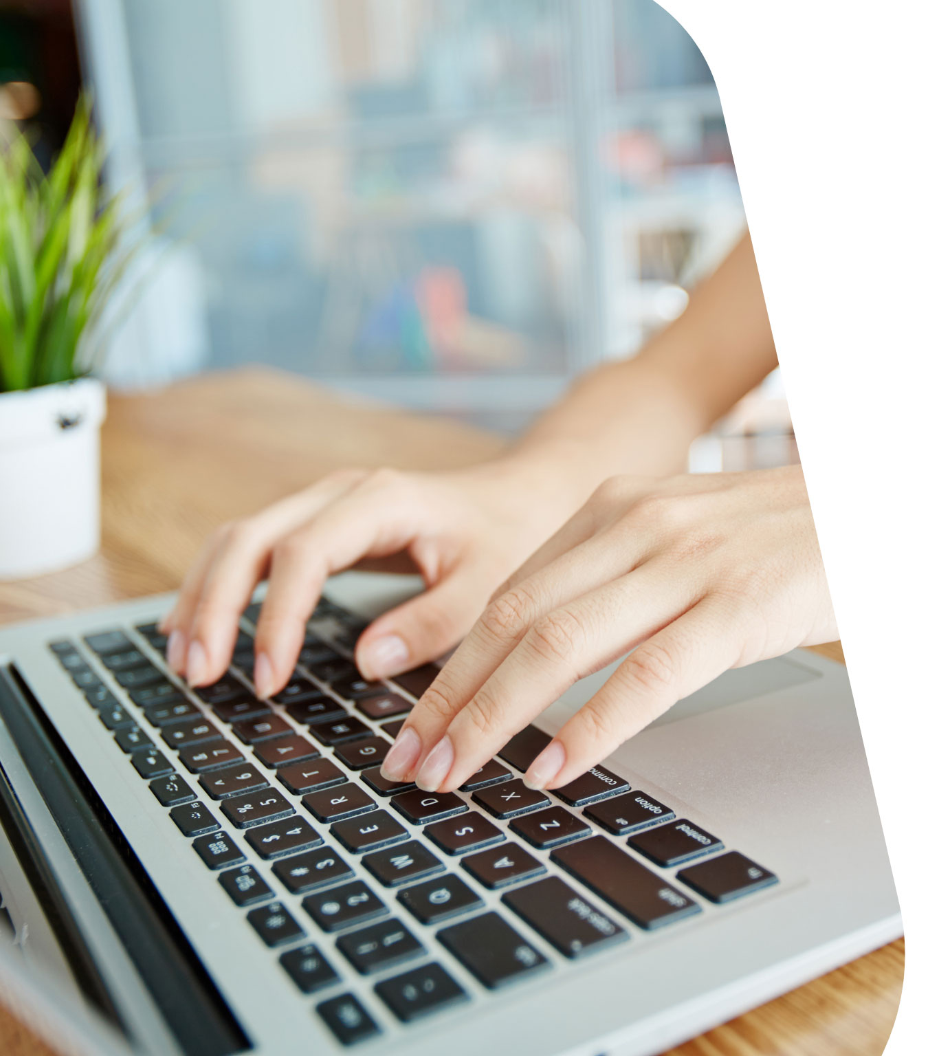 Hands typing on keyboard