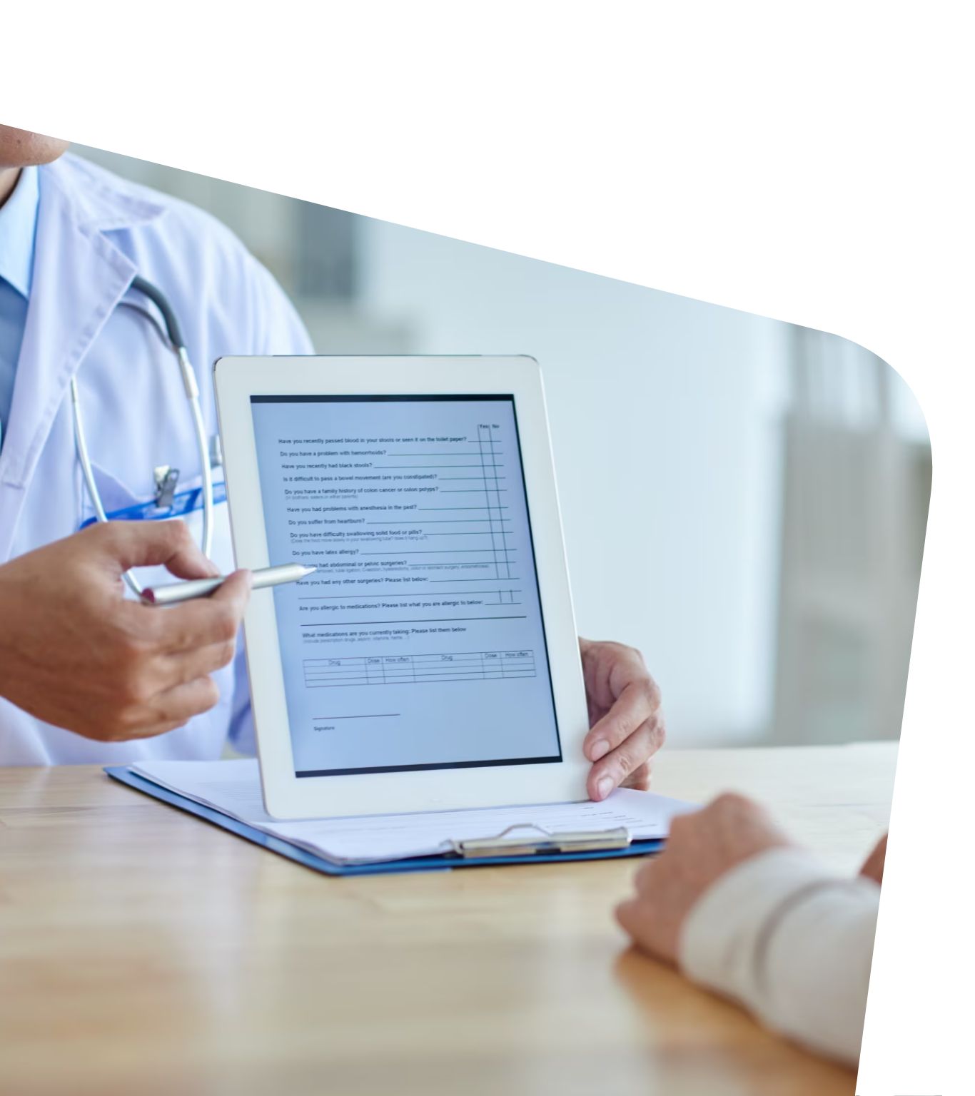 Doctor holding a screening tool for a patient