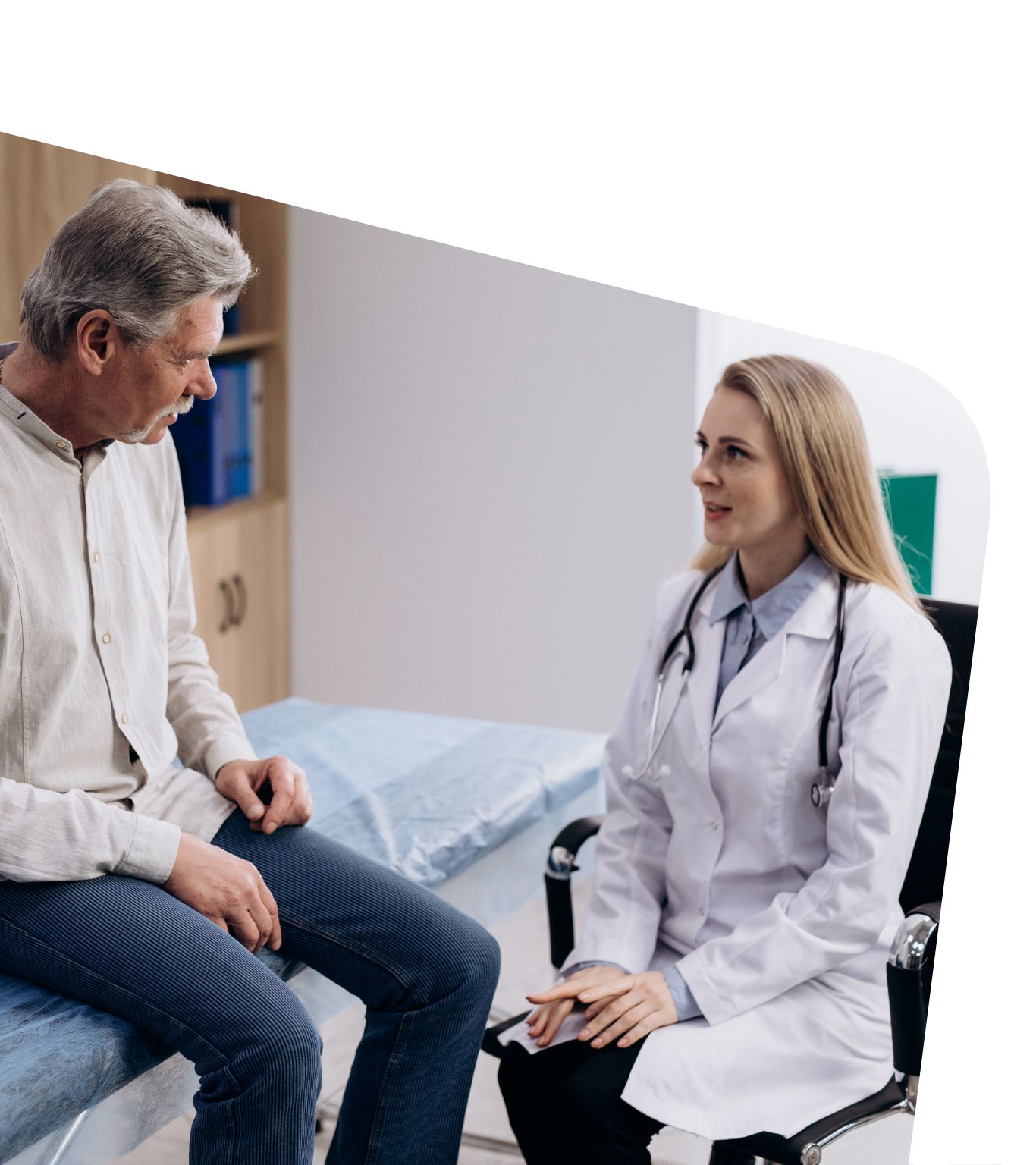 Primary care provider asking a patient questions